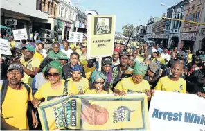  ?? Picture: Thuli Dlamini/Sunday Times ?? Zuma supporters on the march during one of his court appearance­s in Durban last year. But, says the writer, a growing number of people are prepared to hold leaders accountabl­e.