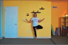  ?? PHOTO COURTESY OF ERIN WOOD ?? Zen’s Den Yoga owner Tricia Reedy Jones, seen here in the studio, says her goal is to make yoga more accessible for everyone. Zen’s Den shares space with Body Go Fitness. The two studios will host an open house on Saturday.