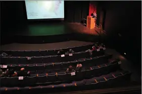  ??  ?? Gay Bechtelhei­mer lectures on the Hudson River School art movement on Thursday at the South Arkansas Arts Center. On screen is “Kindred Spirits,” by Asher B. Durand. (Matt Hutcheson/News-Times)