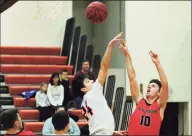  ?? Christian Abraham / Hearst Connecticu­t Media ?? New Canaan’s Tim Russo, right, during a boys basketball game against Shelton in 2016. Russo will be working for UConn basketball as a graduate manager starting later this spring.