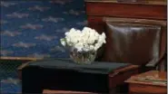  ?? SENATE TELEVISION VIA AP ?? The desk of Sen. John McCain, R-Ariz., is draped in black on the floor of the U.S. Senate on Monday on Capitol Hill in Washington.