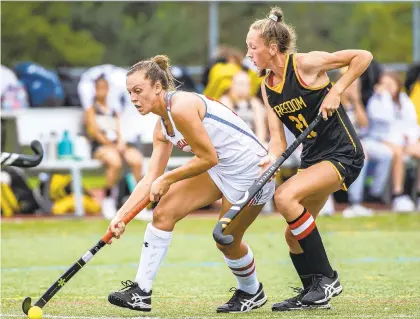  ?? APRIL GAMIZ/THE MORNING CALL ?? Parkland’s Emma Brayford, left,looks to score a goal as Freedom’s Paige Telatovich defends during a high school field hockey game this year. League championsh­ips may alter the order because league champs get top seeds, but entering this week, Parkland is among the top seeds in the District 11 3A tournament, which begins next week.