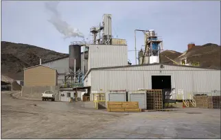  ?? STEVE MARCUS — LAS VEGAS SUN VIA AP, FILE ?? The Silver Peak lithium mine facility near Tonopah, Nev., is seen on Jan. 30, 2017. The Trump administra­tion granted final approval for a proposed northern Nevada lithium mine, one of several last-minute moves made by the Department of Interior to greenlight mining and energy projects. Unlike some other approvals, which are likely to be revoked, President Biden has voiced support for lithium mining as part of his energy plans.