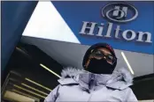  ?? CHARLES KRUPA — THE ASSOCIATED PRESS ?? Hotel housekeepe­r Esther Montanez outside the Hilton Back Bay in Boston on Friday.