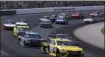  ?? CHARLES KRUPA — THE ASSOCIATED PRESS ?? Erik Jones (20) banks into the first turn during a NASCAR Cup Series race in Loudon, N.H.