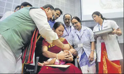  ?? HT FILE ?? Union minister of health & family welfare JP Nadda administer­s vaccine to a child during the launch of second phase Expansion of Rotavirus Vaccinatio­n at Pragna Bhawan, Agartala in February this year. A wide range of vaccines are now available in India...