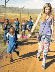  ?? Picture: GETTY IMAGES ?? HELPING HAND: Joss Stone was in Lesotho last month to promote Sentebale, a children’s charity set up by Britain’s Prince Harry and Lesotho’s Prince Seeiso