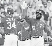  ?? JOHN BAZEMORE
THE ASSOCIATED PRESS ?? Washington’s Bryce Harper celebrates a spring-training home run against Detroit on Sunday in West Palm Beach, Fla.