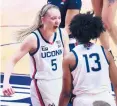  ?? BY BRAD HORRIGAN/HARTFORD COURANT ?? UConn guard Paige Bueckers (5) became the first freshman to win the Associated Press Player of the Year award.