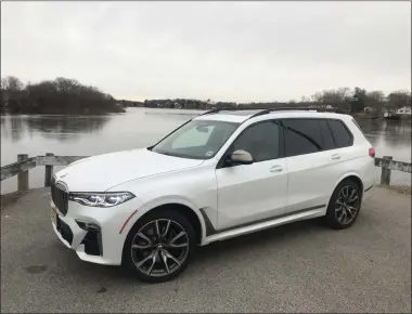  ?? MARC GRASSO — BOSTON HERALD ?? The BMW X7M50i is a standout performer, a seven-passenger sport activity vehicle that makes driving a pleasure.