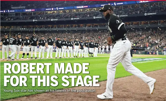  ?? STACY REVERE/GETTY IMAGES ?? Sox center fielder Luis Robert (shown running onto the field during pregame introducti­ons Sunday) says the key to his playoff success has been his ability not to chase pitches out of the strike zone.