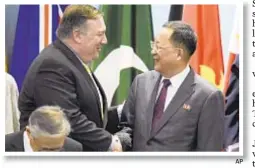  ?? AP ?? Secretary of State Pompeo greets North Korea's Foreign Minister Ri Yong-ho Saturday in Singapore.
