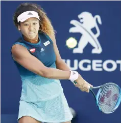  ??  ?? Osaka serves to Belgium’s Yanina Wickmayer during the Miami Open at Hard Rock Stadium, Florida. — USA TODAY Sports