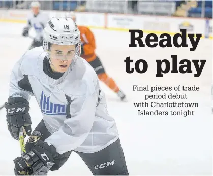  ?? JASON MALLOY • THE GUARDIAN ?? Centre Pat Guay chases a loose puck in the corner during Tuesday’s Charlottet­own Islanders practice at the Eastlink Centre.