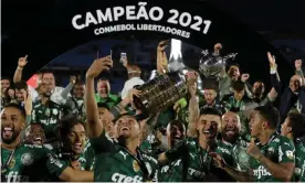  ?? Photograph: Juan Mabromata/AFP/Getty Images ?? Palmeiras players celebrate after beating Flamengo in the final of the Copa Libertador­es.