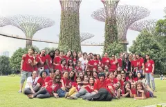  ??  ?? Domestic helpers gather for a picture during an outing to Marina Bay Sands in Singapore. Many of the workers from Myanmar, the Philippine­s, Indonesia and India have taken shelter from abusive employers.