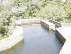  ??  ?? Forebay, Lwuwa Franciscan Mission Micro Hydro Plant, near Mwinilunga