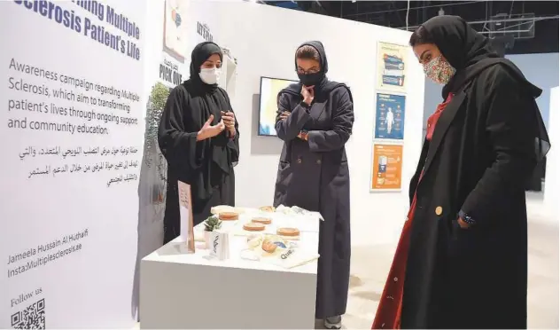  ??  ?? Noura Al Kaabi tours the exhibition in ↑ Abu Dhabi.