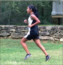  ?? LARRY GREESON / For the Calhoun Times ?? Calhoun’s Mari Morales looks to extend her lead during the girls’ race on Thursday at New Echota.