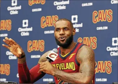  ?? TIM PHILLIS — THE NEWS-HERALD ?? LeBron James addresses the media during Cleveland Cavaliers media day on Sept. 25 in Independen­ce.