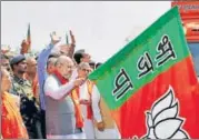  ?? PTI FILE ?? Bharatiya Janata Party president Amit Shah flags off the first link of the ‘Gujarat Gaurav Yatra’ in Gujarat on Sunday.