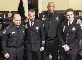  ?? OLIVER CONTRERAS Pool photo via Getty Images ?? From left, U.S. Capitol Police Sgt. Aquilino Gonell, Washington Metropolit­an Police Officer Michael Fanone, U.S. Capitol Police Officer Harry Dunn and Washington Metropolit­an Police Officer Daniel Hodges pose following their testimony on Tuesday.