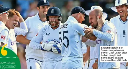  ?? ?? England captain Ben Stokes congratula­tes bowler Jack Leach after he had caught and bowled New Zealand batsman Henry Nicholls