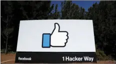  ??  ?? This March 28 file photo shows the Facebook logo at the company’s headquarte­rs in Menlo Park. Facebook says it will stop spending money to fight a proposed California ballot initiative aimed at giving consumers more control over their data. AP PHOTO/...