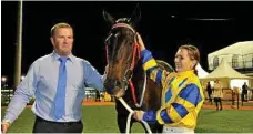  ?? PHOTO: DAVE NOONAN ?? HISTORIC WIN: Trainer Michael Nolan and Skye Bogenhuber with Miss Imagica after their 2013 Weetwood Handicap win.