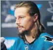  ?? JOSIE LEPE, THE ASSOCIATED PRESS ?? New Sharks defenceman Erik Karlsson met the media in San Jose on Wednesday.