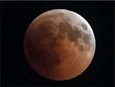  ?? AFP/Getty Images ?? A “blood moon” eclipse in 2018 over Turkey.