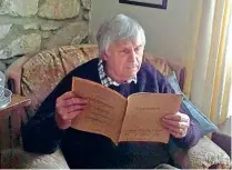  ??  ?? Memories, memories: Lifelong railway enthusiast Stefan Gronkowski reads one of three archive railwayana catalogues he unearthed in the loft of his home near St Austell. JANET GRONKOWSKI