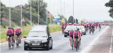  ??  ?? Members of North Down Cycling Club ride alongside the hearse at the funeral of their friend Gavin Moore (inset), and (right) family and friends in the cortege