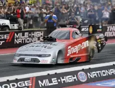  ?? Andy Cross, The Denver Post ?? Funny Car driver Cruz Pedregon races in the second round of qualifying Saturday.