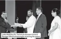  ??  ?? Lanka Walltiles PLC Technical Assistant General Manager Nihal Kumarasing­he receiving the award