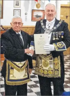  ?? SUBMITTED ?? Don McCoy, left, has been a Mason for 50 years. He was recently presented with an award for his longtime dedication to the organizati­on. Provincial Grand Master of Masons, James Luddington, made the presentati­on.