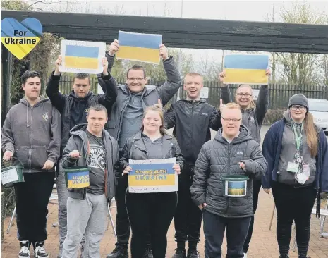  ?? ?? Students from Portland Academy taking part in a sponsored walk to raise money for refugee families fleeing war-torn Ukraine.