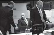  ?? AP/ZBIGNIEW BZDAK ?? Chicago police Officer Thomas Gaffney (from left), ex-Officer Joseph Walsh and former Detective David March arrive in court Tuesday on the first day of their bench trial before Judge Domenica A. Stephenson at Leighton Criminal Court Building in Chicago.