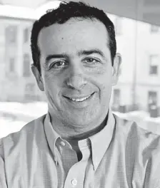  ?? Courtesy oF MassaCHuse­tts General HosPItal; Below, aP FIle ?? ‘EVOLUTIONA­RY PATHWAY’: Dr. David Fisher, director of the MGH Cancer Center’s melanoma program, is the author of a new study that has found people with low levels of vitamin D might be at an increased risk for opioid dependency or addiction. Vitamin D supplement­s, below, could be a ‘cheap and easy and safe’ way to treat addiction, according to Fisher.