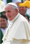  ??  ?? POPE FRANCIS arrives to lead an open air mass in Yangon in this Nov. 29 photo.