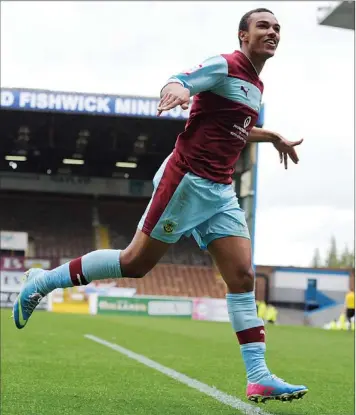  ?? PICTURES: Phil Heywood ?? OPENER: Junior Stanislas celebrates after scoring the first Burnley goal