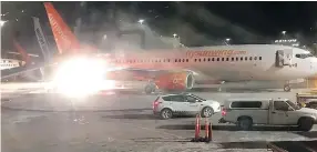  ??  ?? A picture from the Facebook account of Connie Carson shows a Sunwing airplane (front) colliding with a WestJet plane (left rear) at Toronto’s Pearson Airport on Friday. — AFP/GETTY IMAGES