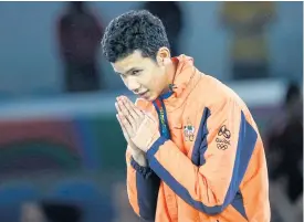  ??  ?? Tawin Hanprab reacts after receiving his silver medal at the 2016 Rio Games.