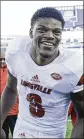  ?? DAVID STEPHENSON / AP ?? Louisville quarterbac­k Lamar Jackson, a former Boynton Beach High star, won the Heisman Trophy in 2016.