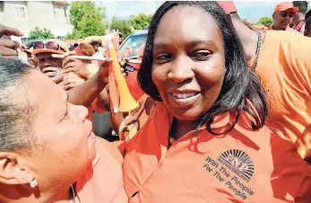  ?? FILE ?? ‘Keisha the Teacher’ (right) says she has found a new family in NW St Andrew.