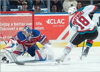  ?? MARISSA BAECKER/Shoot the Breeze ?? Carsen Twarynski of the Kelowna Rockets is denied in the shootout by Todd Scott of the Edmonton Oil Kings during WHL action Saturday at Prospera Place.