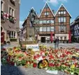  ?? Foto: dpa ?? Noch liegen am Unglücksor­t in Münster viele Blumen und Kerzen.