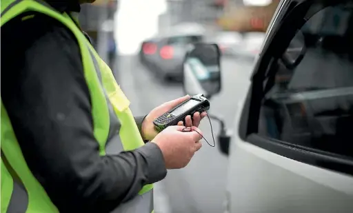  ?? LAWRENCE SMITH/ STUFF ?? Auckland parking officers regularly face abuse.