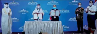  ?? — Supplied photo ?? Suhail bin Mohammed Faraj Faris Al Mazrouei, Luhut Binsar Pandjaitan, Sultan Ahmed bin Sulayem and Dr Alim Markus at the signing ceremony in Jakarata on Saturday.