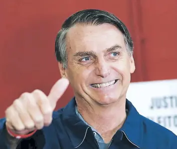  ?? FOTO: AFP ?? Jair Bolsonaro obtuvo la victoria el domingo en la primera vuelta de las presidenci­ales en Brasil. Agencia AFP